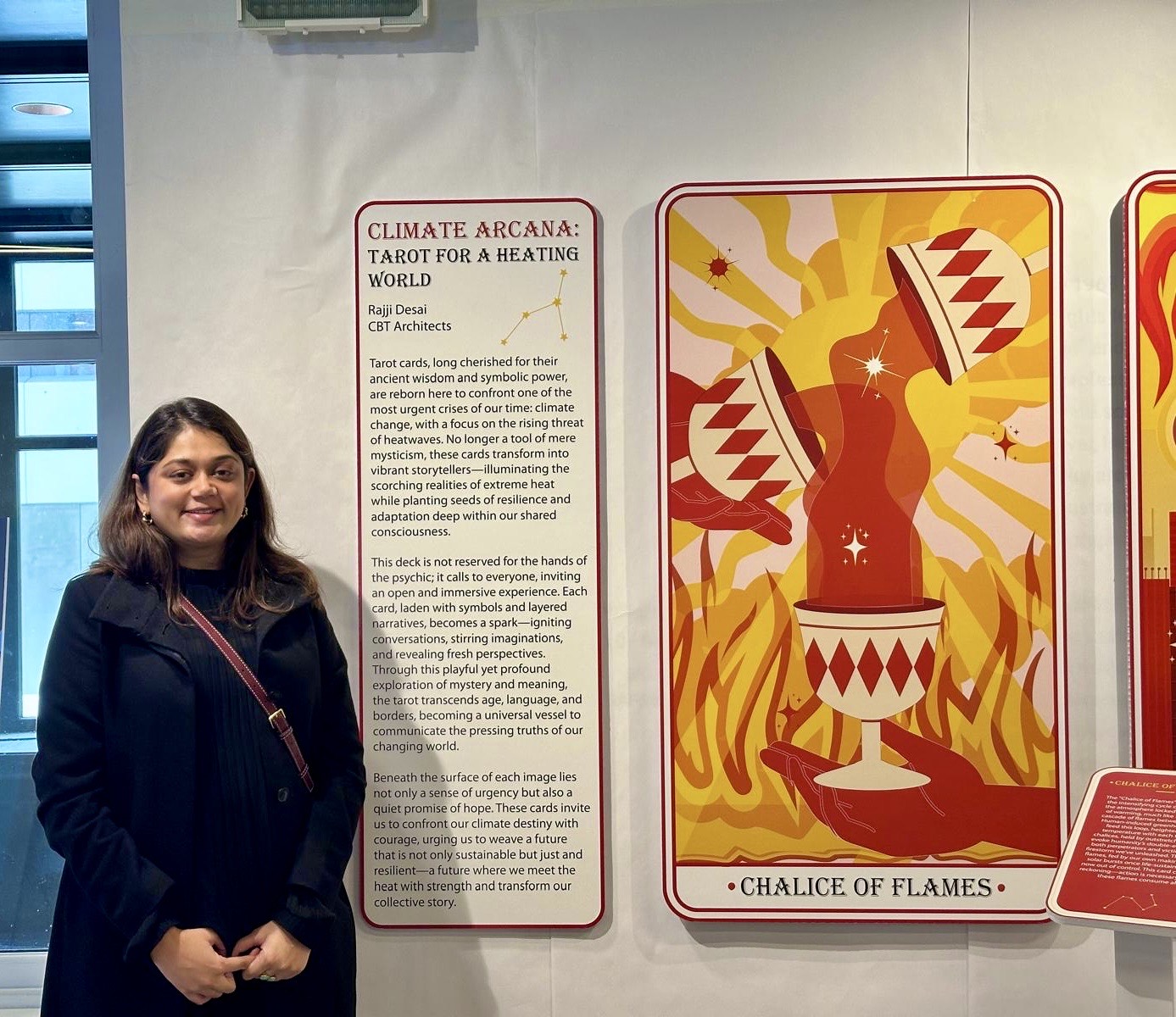 CBT's Rajji Desai with her artwork, "Climate Arcana: Tarot for a Heating World"